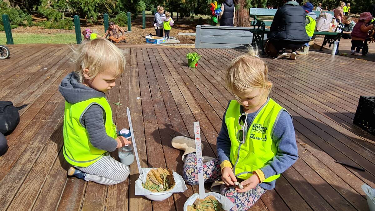 Xavier, 2, and Mylah, 4, partake in a potting activity with Ballarat Botanikids. Picture by Gabrielle Hodson 