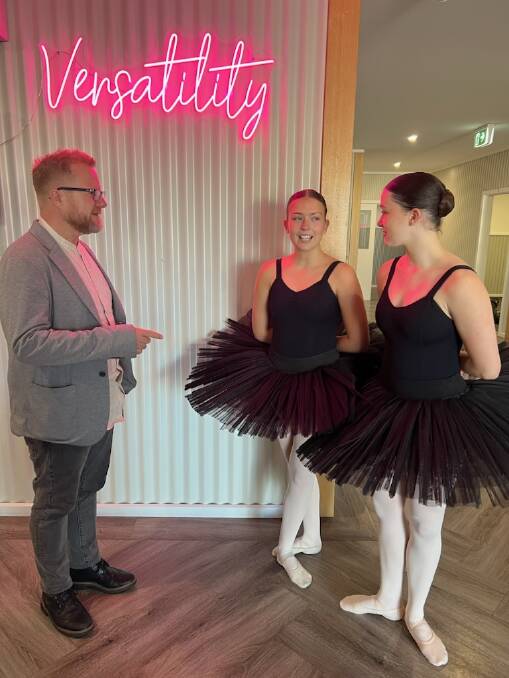 Royal Academy of Dance chief executive Tim Arthur talks with Ava Sheehan and Milly Wakefield. Supplied picture