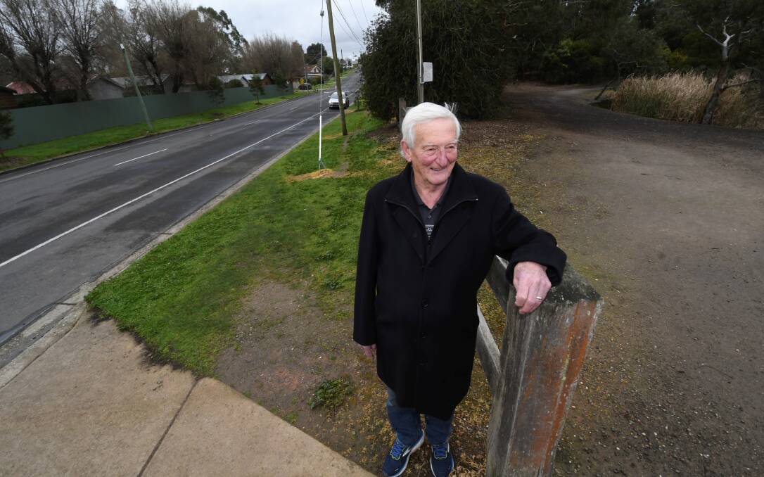 Ballarat East resident David Crocker stands at a section of nature strip he says is in need of a footpath. Picture by Lachlan Bence
