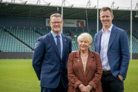 Tasmanian Football Club chairman Grant O'Brien with Julie Kay and ambassador Jack Riewoldt earlier this year. Picture by Paul Scambler