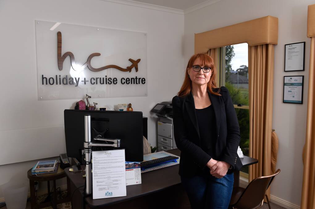 STRUGGLE: Holiday & Cruise Centre owner Nicole King, working from her home office, is just one story from a travel industry still grappling with the devastation of COVID-19. Picture: Adam Trafford