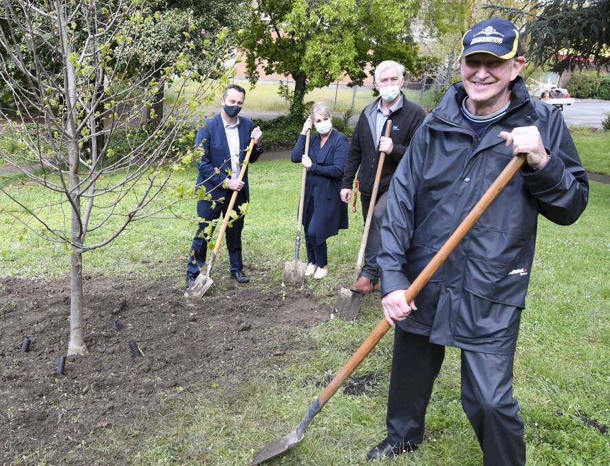 SELFLESS: Bob Carmichael (front) with Ballarat mayor Daniel Moloney, Ballarat Group Training traineeship and apprentice consultant Julie Butler and CEO Graham McMahon at the tree dedicated in his honour. Picture: Lachlan Bence