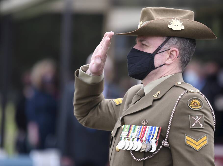 SALUTE: A member of the Australian Army pays his respects during last year's Remembrance Day service. Picture: Lachlan Bence
