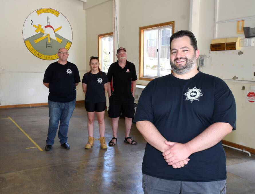 FOR SALE: Buninyong-Mount Helen Fire Brigade captain James Witham and members Gareth Smith, Kimberley Morris-Flynn and Bruce Morley in the old station. Picture: Lachlan Bence