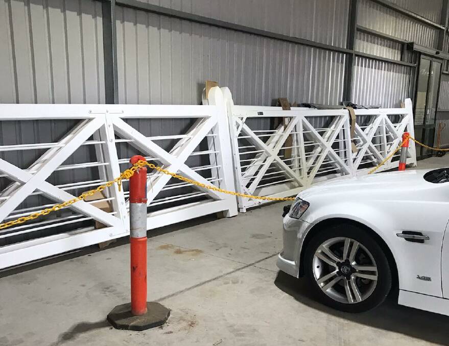 READY: Replica heritage gates in storage in Maryborough. Picture: supplied