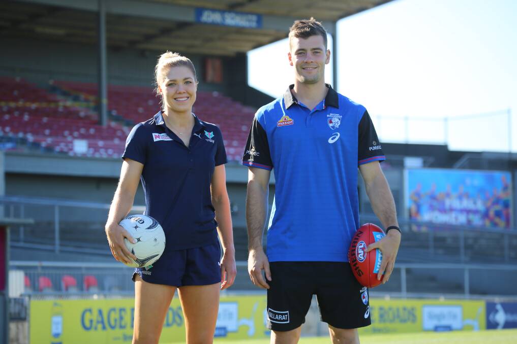BALLARAT-BOUND: Melbourne Vixens captain Kate Moloney and Western Bulldogs skipper Josh Dunkley at the Whitten Oval ahead of both clubs' trips to Ballarat. Picture: supplied