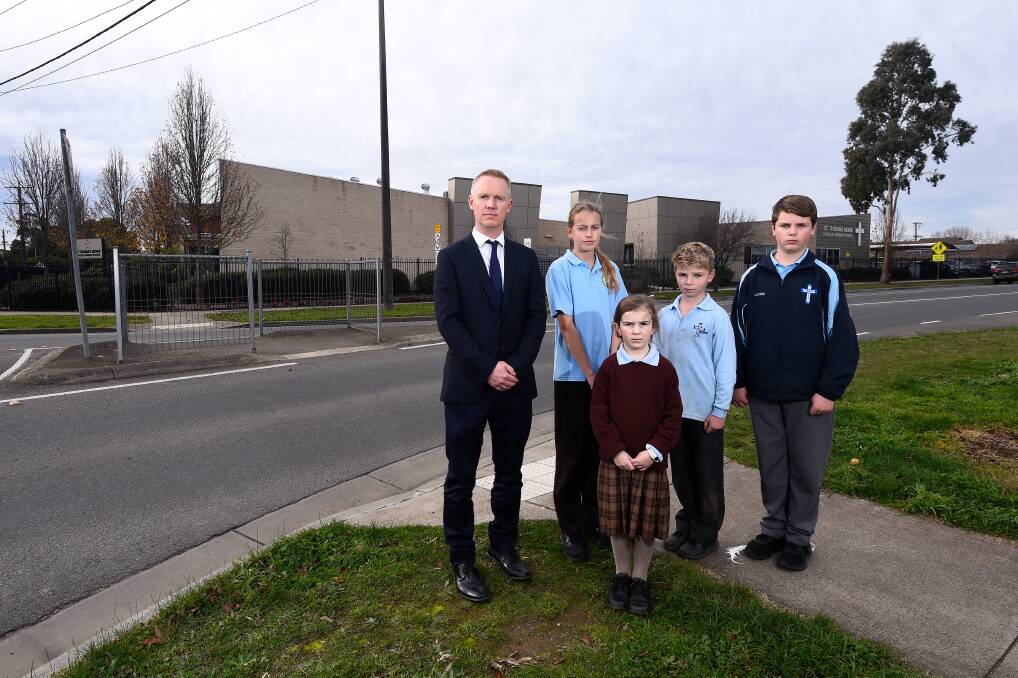CONCERNED: St Thomas More Catholic Primary School principal Simon Duffy with students Eliza, Emma, Campbell and Lachie. Picture: Adam Trafford