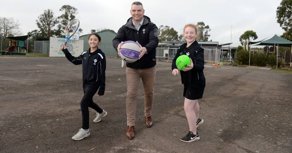 PLAY BALL: Invermay Primary School principal Justin Marshman and school captains Dania Kamarul and Dilana Romeril on the site. Pictures: Kate Healy