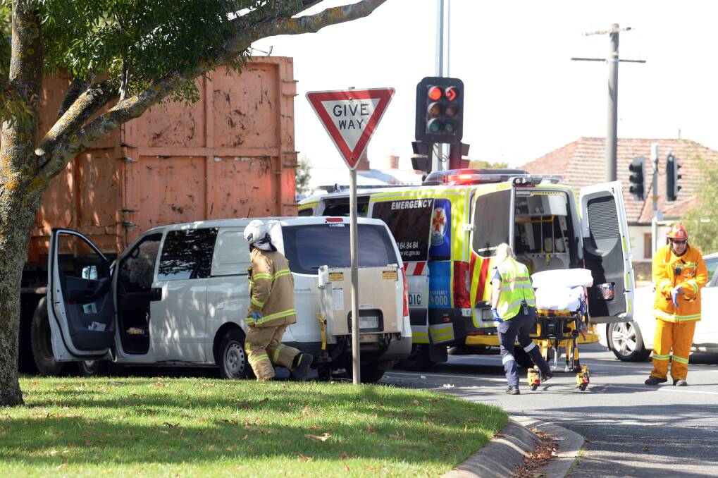 Emergency services at the scene of the fatal crash on Victoria Street. Pictures: Kate Healy