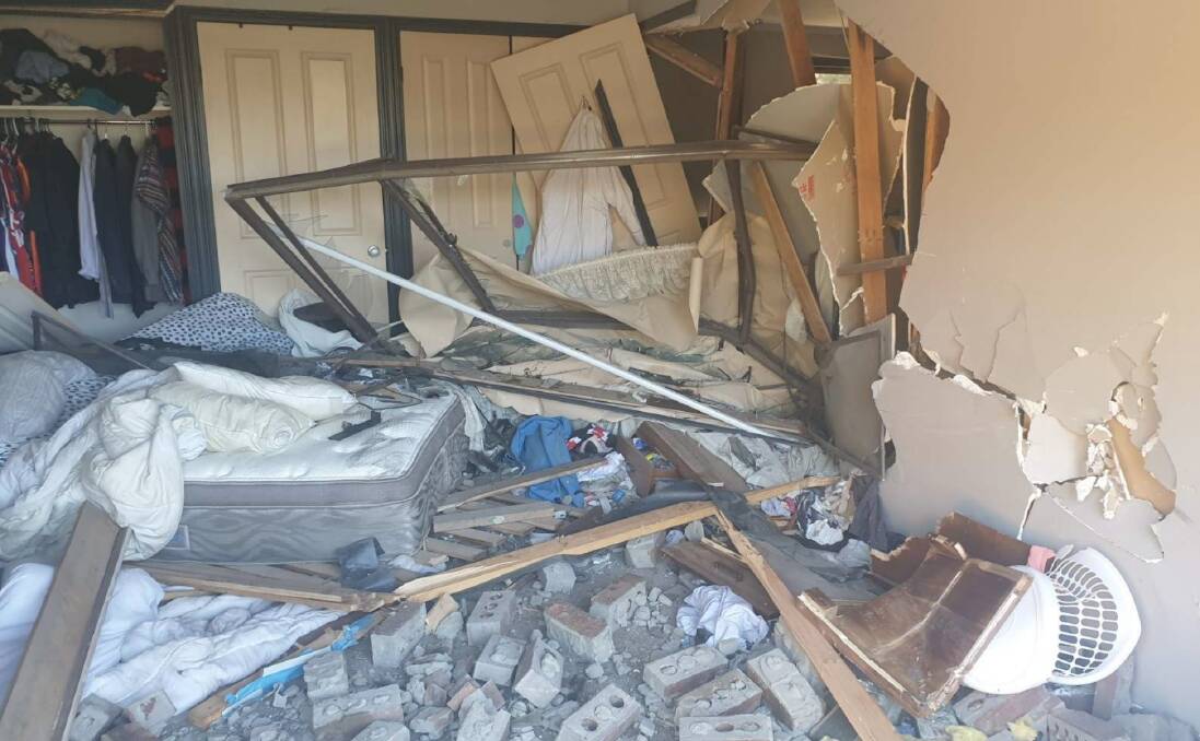 SHAMBLES: The state of the couple's bedroom shortly after the car was removed. Tyre marks are visible on the corner of the mattress. Pictures: supplied
