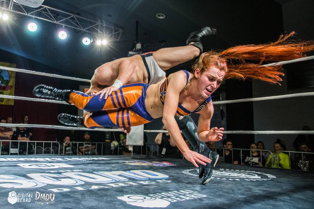 Jessica Troy giving a hurricanrana to Punch-Drunk Istria during one of Deathmatch Downunder's intergender matches.