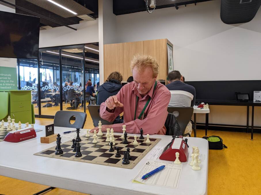 CHECKMATE: Ballarat Chess Club president Patrick Cook makes a move at the Begonia Open.