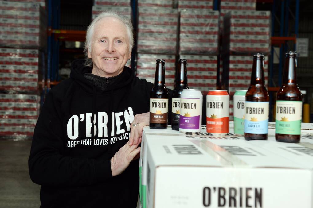 Mr O'Brien with Rebellion Brewing's range of O'Brien beers.