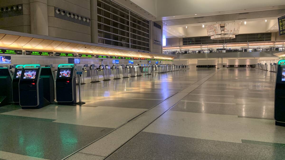 An empty LAX airport devoid of its usual 24-hour hustle and bustle.