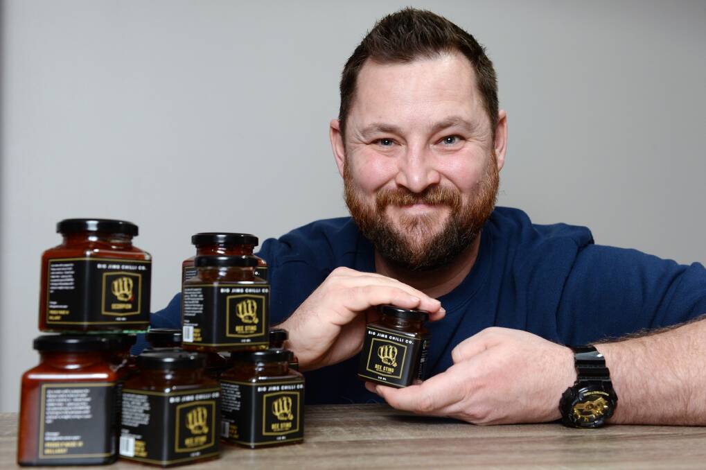 HOT STUFF: Big Jims Chilli Co. owner James Hawkins with the award-winning hot honey. Picture: Kate Healy