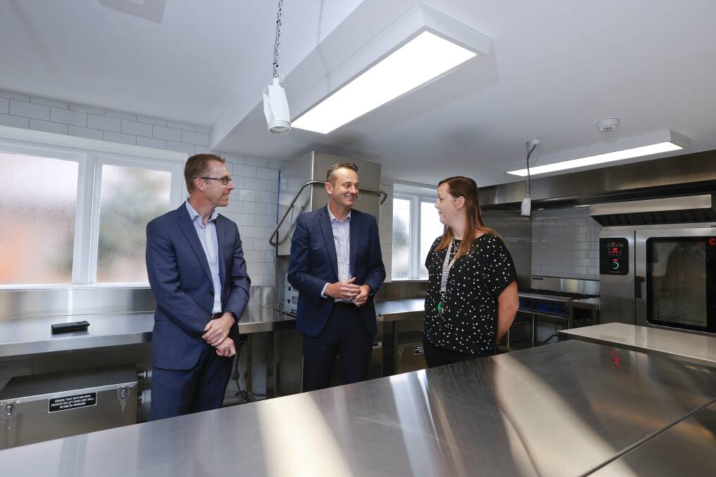 OPEN FOR BUSINESS: City of Ballarat chief executive Evan King, mayor Daniel Moloney and venue coordinator Jessika Hall in the new kitchen at Civic Hall. Picture: Luke Hemer
