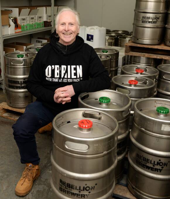 CHEERS: Rebellion Brewing managing director and founder John O'Brien. Picture: Kate Healy