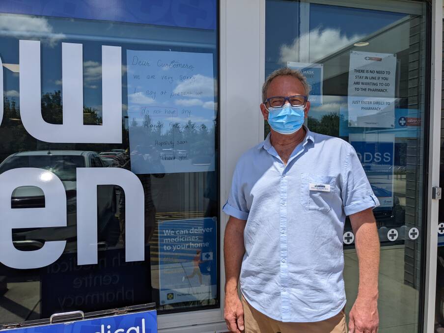 ALL OUT: Pharmacist at Ballarat Family Care Pharmacy and Arch Medical Centre Pharmacy Paul Pickersgill in front of a sign informing customers about stock issues.