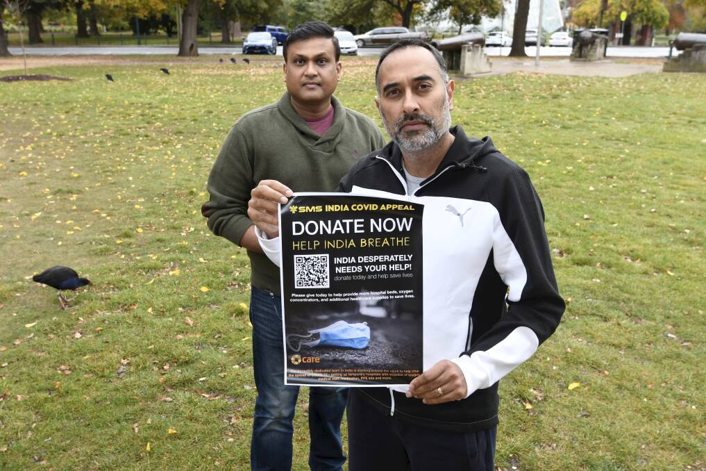 City of Ballarat intercultural ambassador Bobby Mehta and Raj Sannappareddy promoting the SMS India COVID Appeal. Picture: Lachlan Bence
