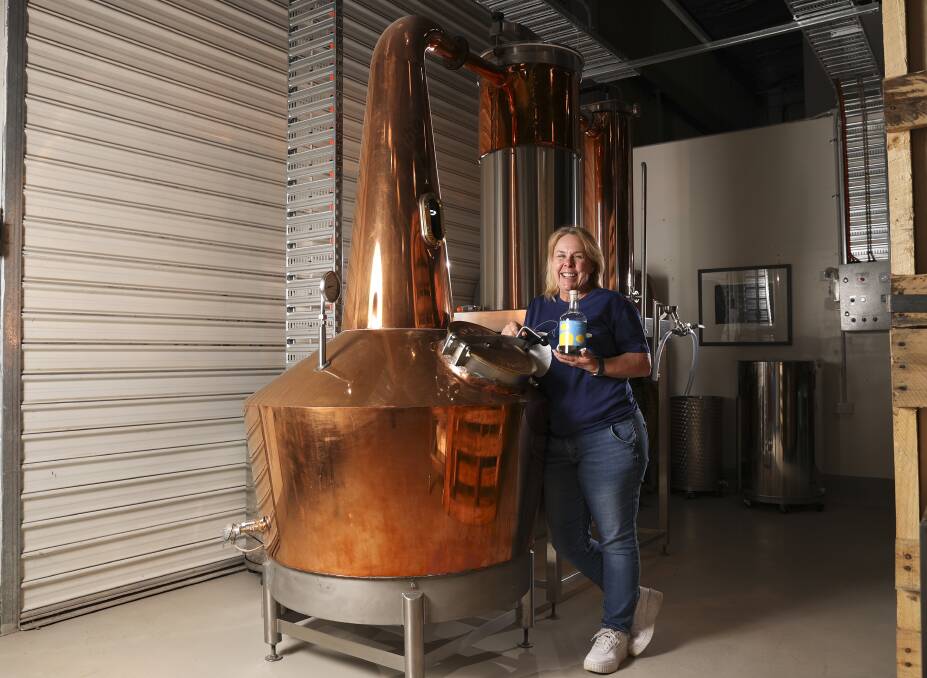 CHEERS: Red Duck co-owner Vanessa Wilson-Browne with the business' new still and gin. Picture: Luke Hemer