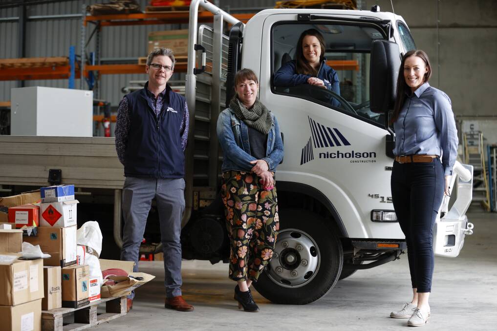 BUILDING: Cathal Finnegan, Bernadette Purton and Kasey Cornwell of Nicholson Construction with Rose Durey from Women's Health Grampians. Picture: Luke Hemer
