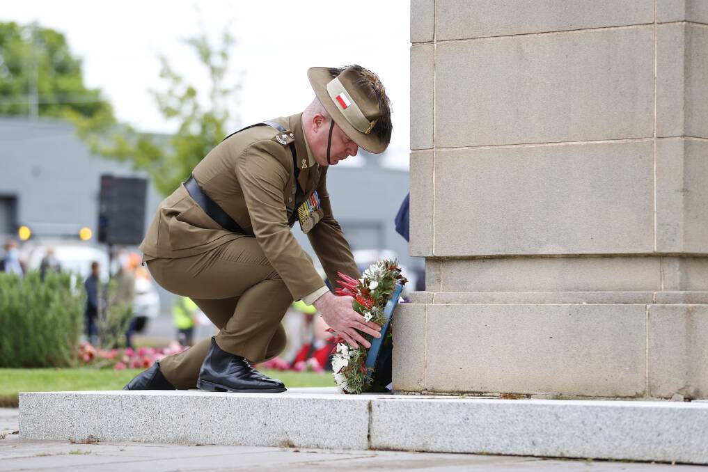 Lieutenant Colonel Shaun Richards lays a wreath at the Ballarat Cenotaph. Pictures: Luke Hemer