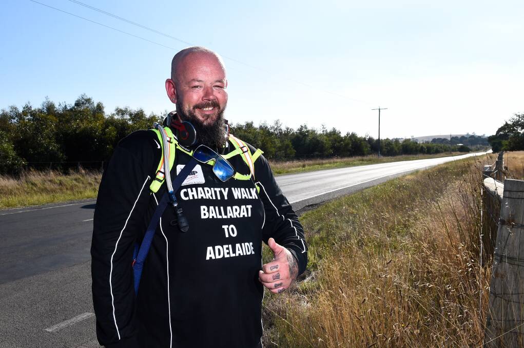 ON FOOT: Alan Thorpe started his walk on Saturday morning, raising awareness for mental health. Pictures: Adam Trafford