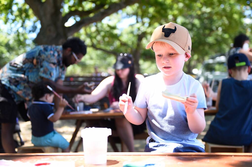 Patrick enjoying some crafts at Picnic in the Park.