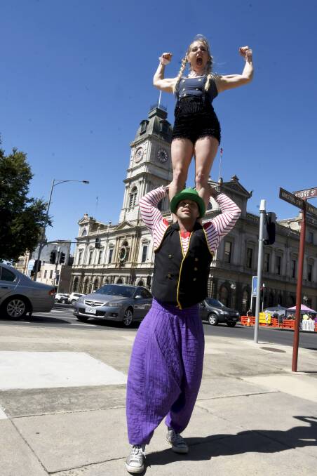 SHOWING OFF: Street performers Erika Hansson and Tom Hanson on Sturt Street. Picture: Lachlan Bence