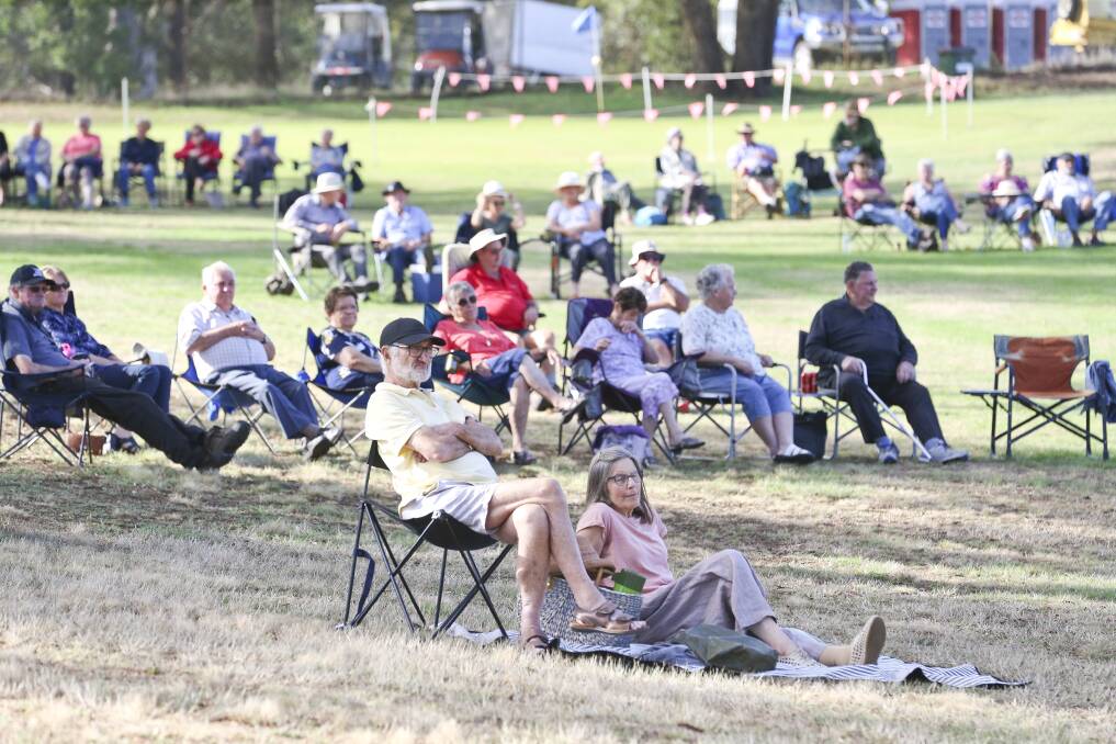 Spectators take in the Brass on the Grass event on the ninth fairway at the Beaufort Golf and Bowls Club on Sunday. Pictures: Luke Hemer