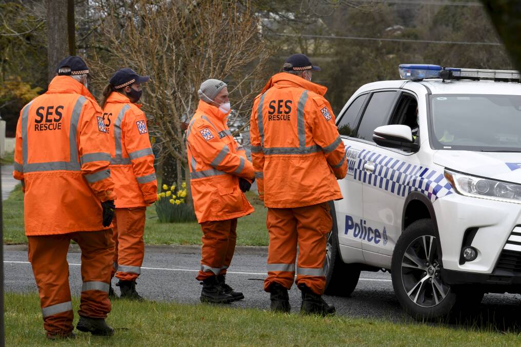 SES members assist police with the roadblocks in and out of Buninyong. Picture: Lachlan Bence