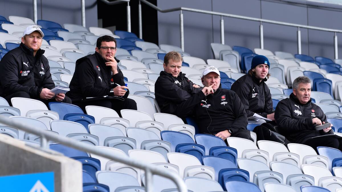 Lappin (far left) and the rest of the Rebels coaching group this season. Picture: Adam Trafford