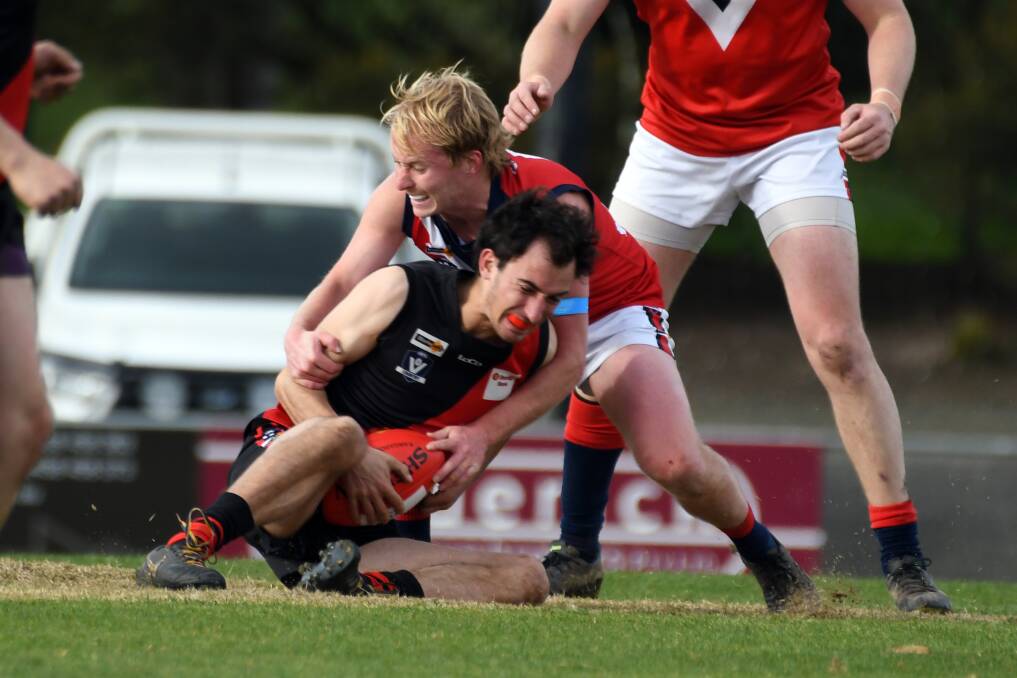 Skipton's Sam Willian tackles Buninyong's Fraser Hunt. Picture: Kate Healy