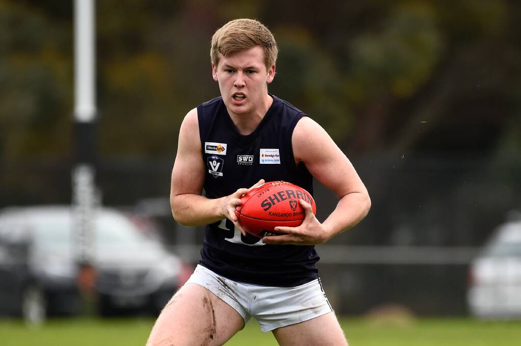 Hayden Thompson looks to move the footy on against Rokewood Corindhap in 2019. Picture: Adam Trafford