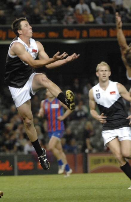 Driscoll flies for a mark in the 2008 VFL Grand Final.