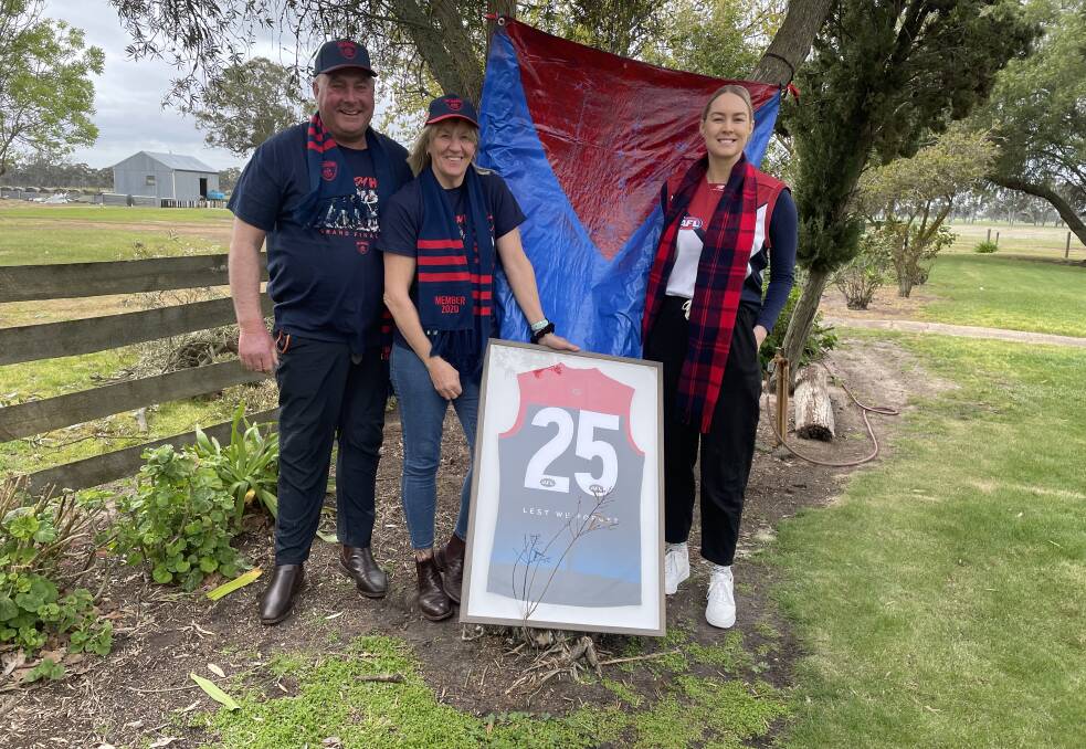 Paul, Cath and Laura McDonald will watch Tom in the AFL grand final from the family farm near Edenhope. Picture: Matt Hughes