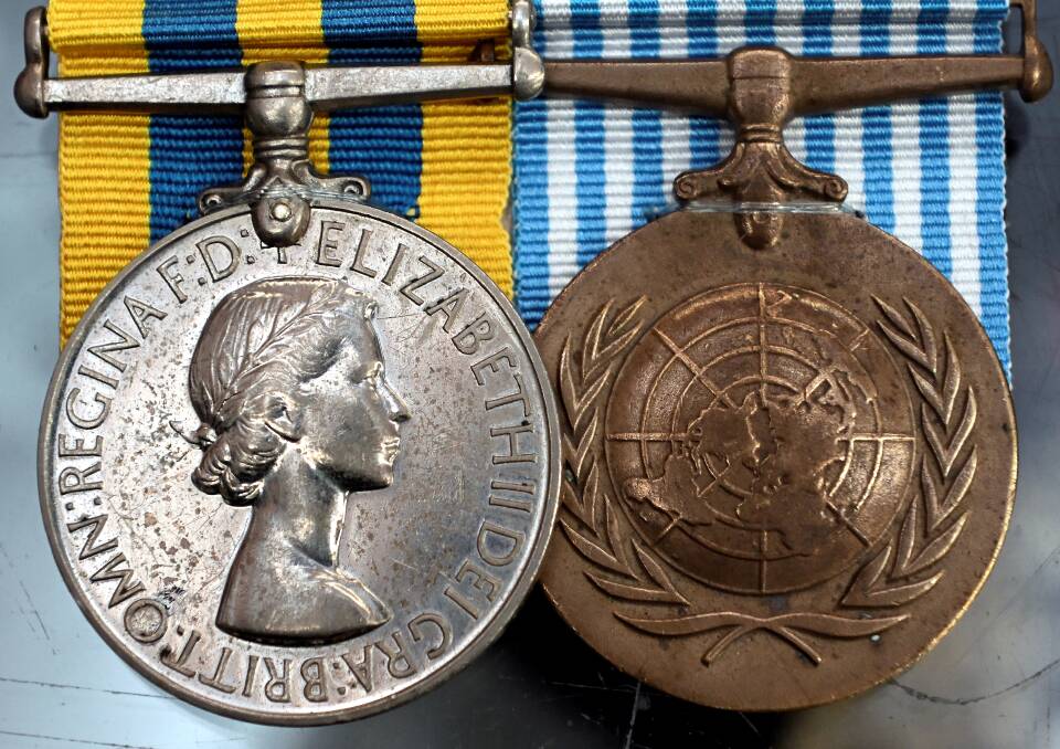 The restored Korean War medals are inscribed with the name F.S Anderson and a service number of 30374. Picture by Lachlan Bence
