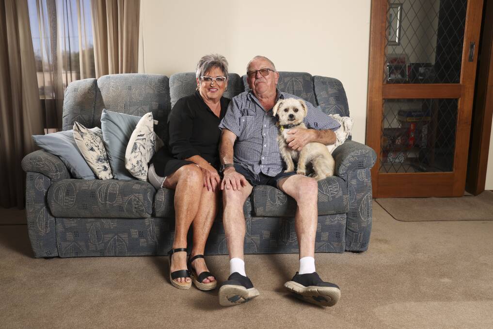 Lifelong love: Phil Jones with his wife Helen and dog Bear. Picture: Luke Hemer. 