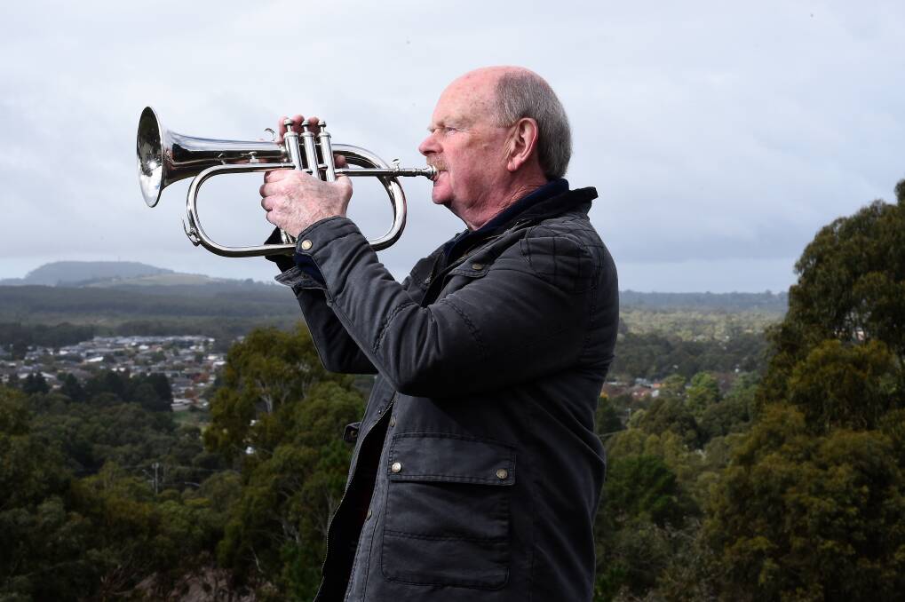 Dennis Hawkes played The Last Post at the Sovereign Hill Lookout during the COVID-19 lockdown, which impacted Anzac Day, 2020. Picture by Adam Trafford