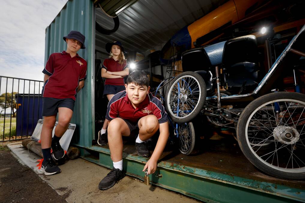 Year six students Billy, Chloe and Ben after Delacombe Primary School's storage container and shed was broken into. Picture: Luke Hemer.