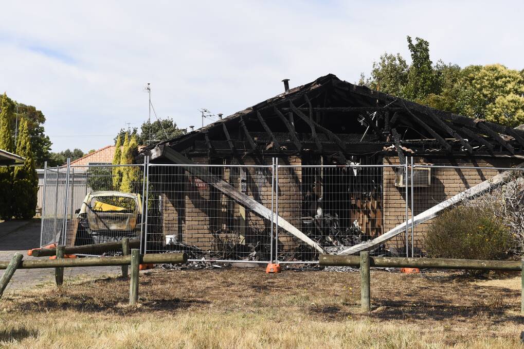 The front of the property, including a car have been severely damaged. Picture: Adam Trafford