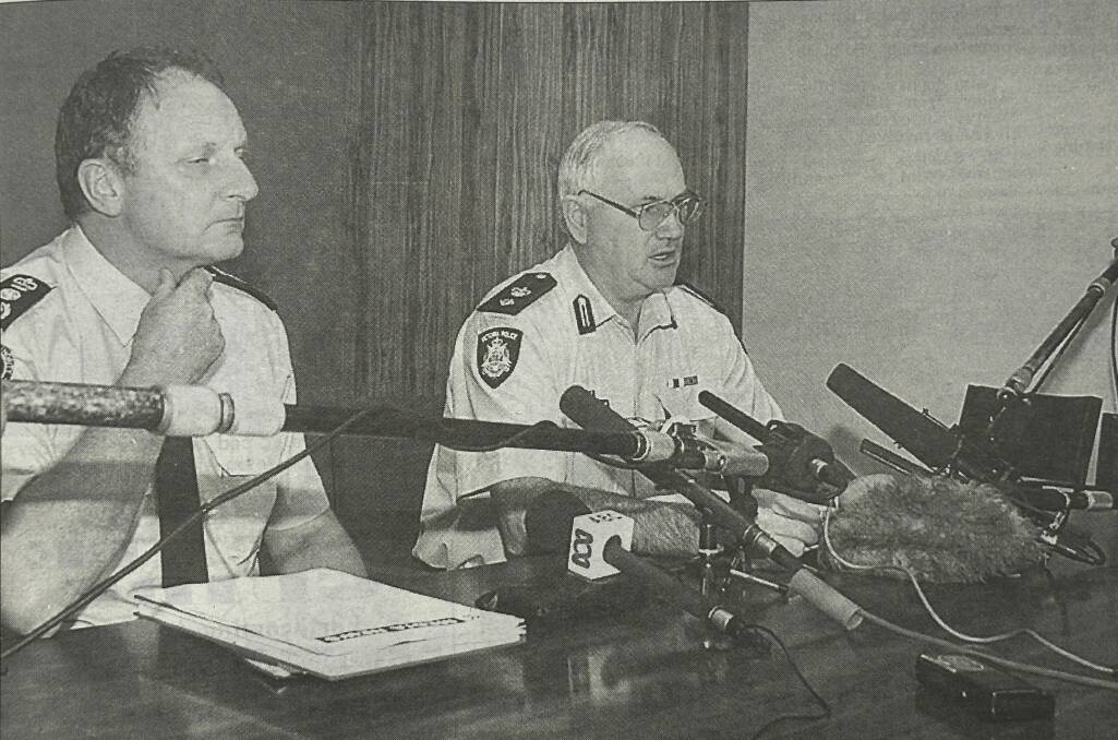 CFA chief officer Tony Roche and Police M district Superintendent Lindsay Florence deliver the news of the deaths at a news conference at 1.30am on December 3, 1998. Picture by Lachlan Bence