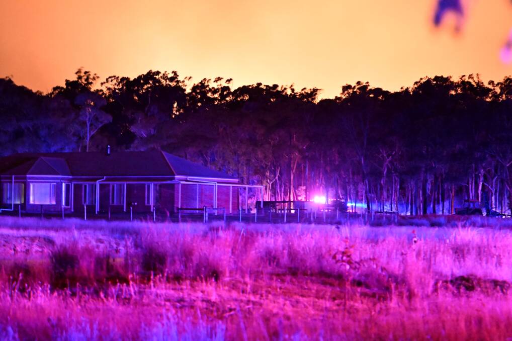 Tuesday's grass fire at Newtown, near Scarsdale, lit up the night sky as residents in surrounding towns were evacuated. Picture by Lachlan Bence