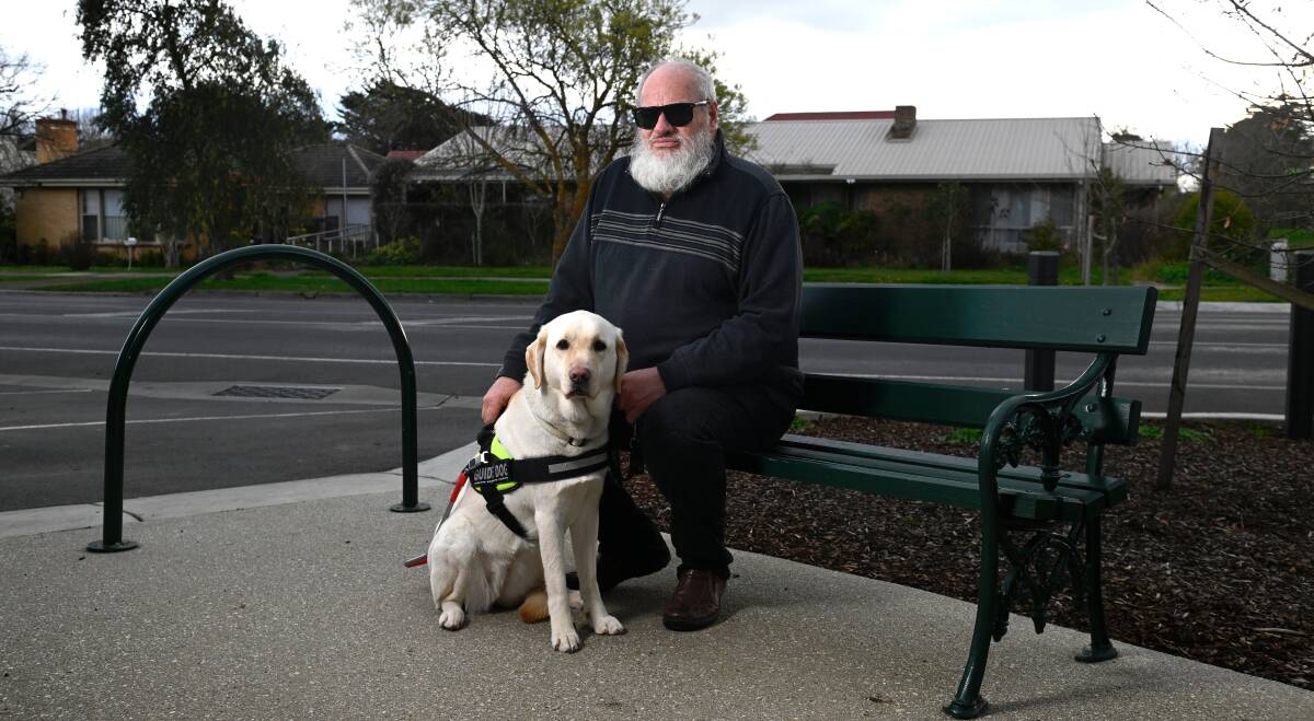 Buninyong resident David Morrison has had several taxis cancel on him after seeing he has a guide dog, Petra. Picture by Adam Trafford