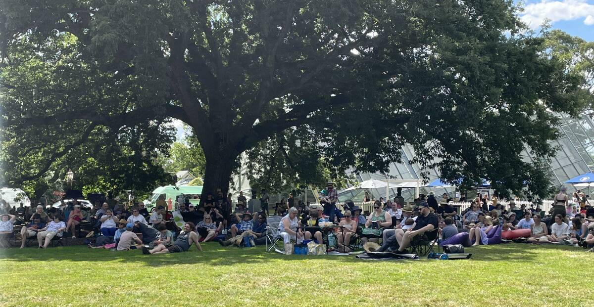 Many took advantage of the garden's massive trees, which provided the right amount of shade from the sun. Picture by Adam Spencer. 