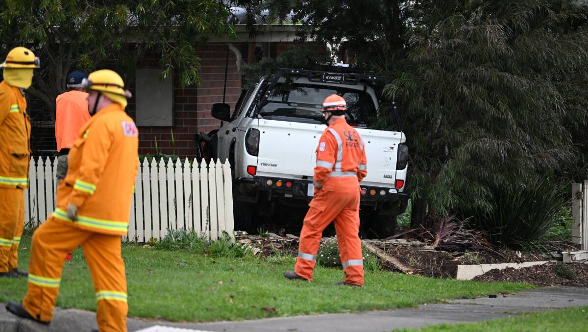 SES volunteers and CFA crews assess the scene of Thursday's incident in Buninyong. Picture by Lachlan Bence