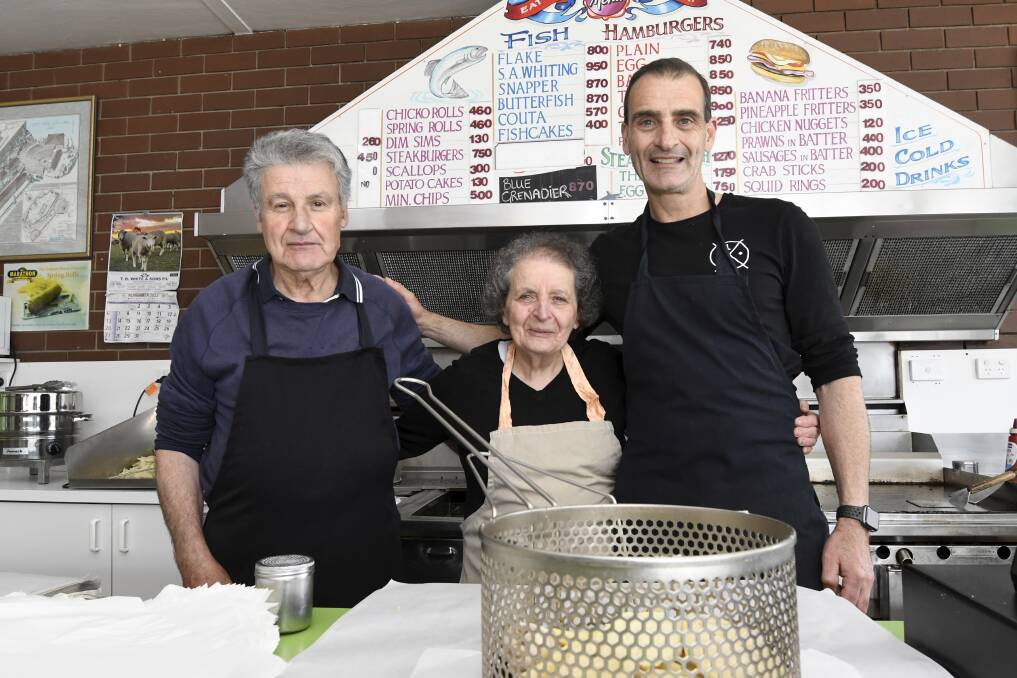 Emmanuel, Effey and George Hontzogloy say the relationships they have built with their customers has been the most rewarding part of running the Latrobe Street fish shop. Pictures by Lachlan Bence. 