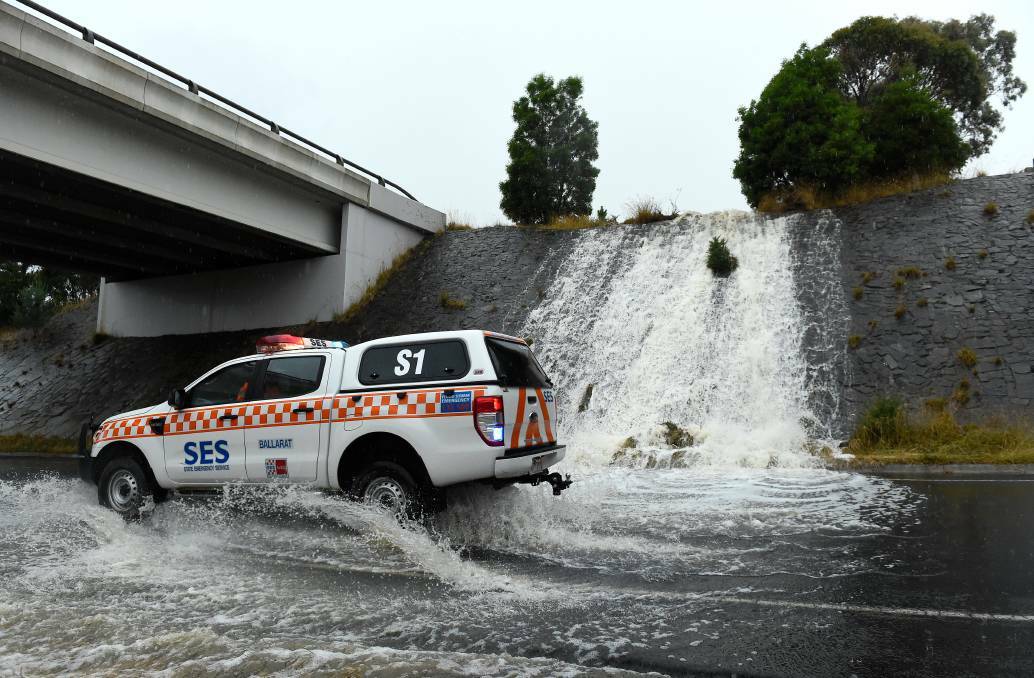 An SES ute responds to flash flooding in Ballarat on Wednesday. Picture: Adam Trafford