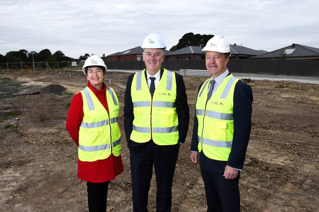 Social housing initiative: Member for Buninyong Michaela Settle, Planning and Housing Minister Richard Wynne and Haven; Home, Safe chair Damien Tangey at the Canadian site. Picture: Adam Trafford.