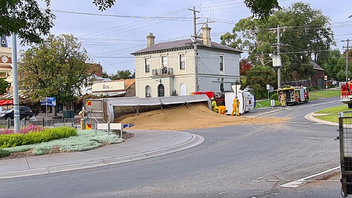 Truck rolls over while navigating Buninyong's central roundabout on 12 April 2022. Photo: Alex Ford
